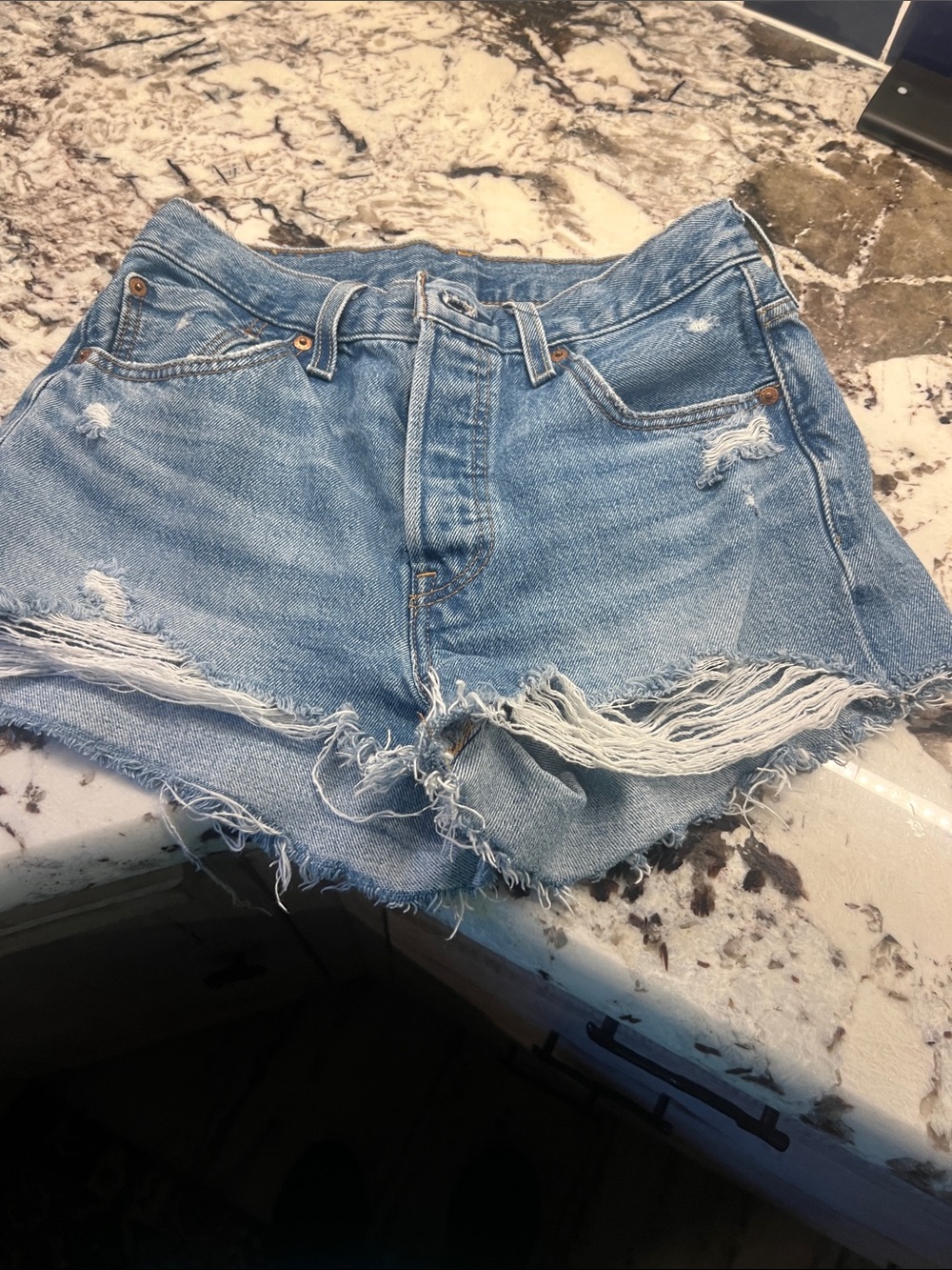 Levi’s Distressed Light Blue Denim Women's Cutoff Shorts
